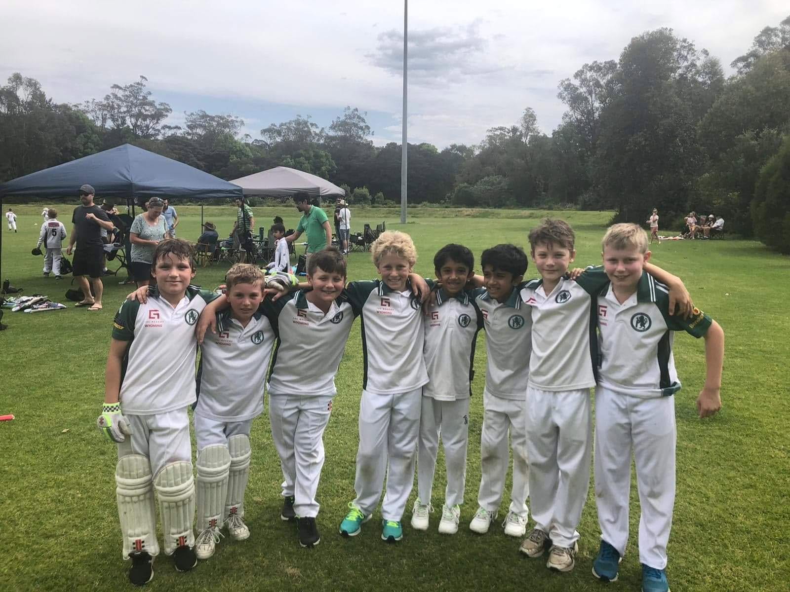 Junior players arm-in-arm after a game