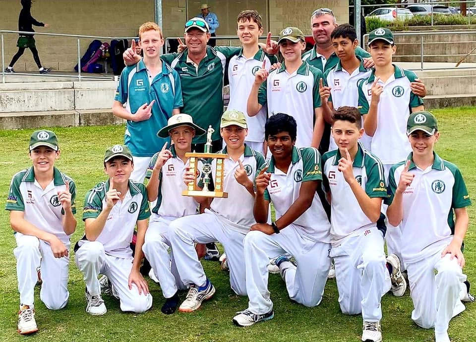 Junior team celebrating with the championship trophy